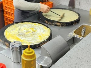 以煎饼果子烹饪技艺为灵魂的魂器学院美食之旅